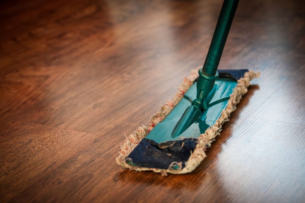 Flat mop cleaning a hardwood floor
